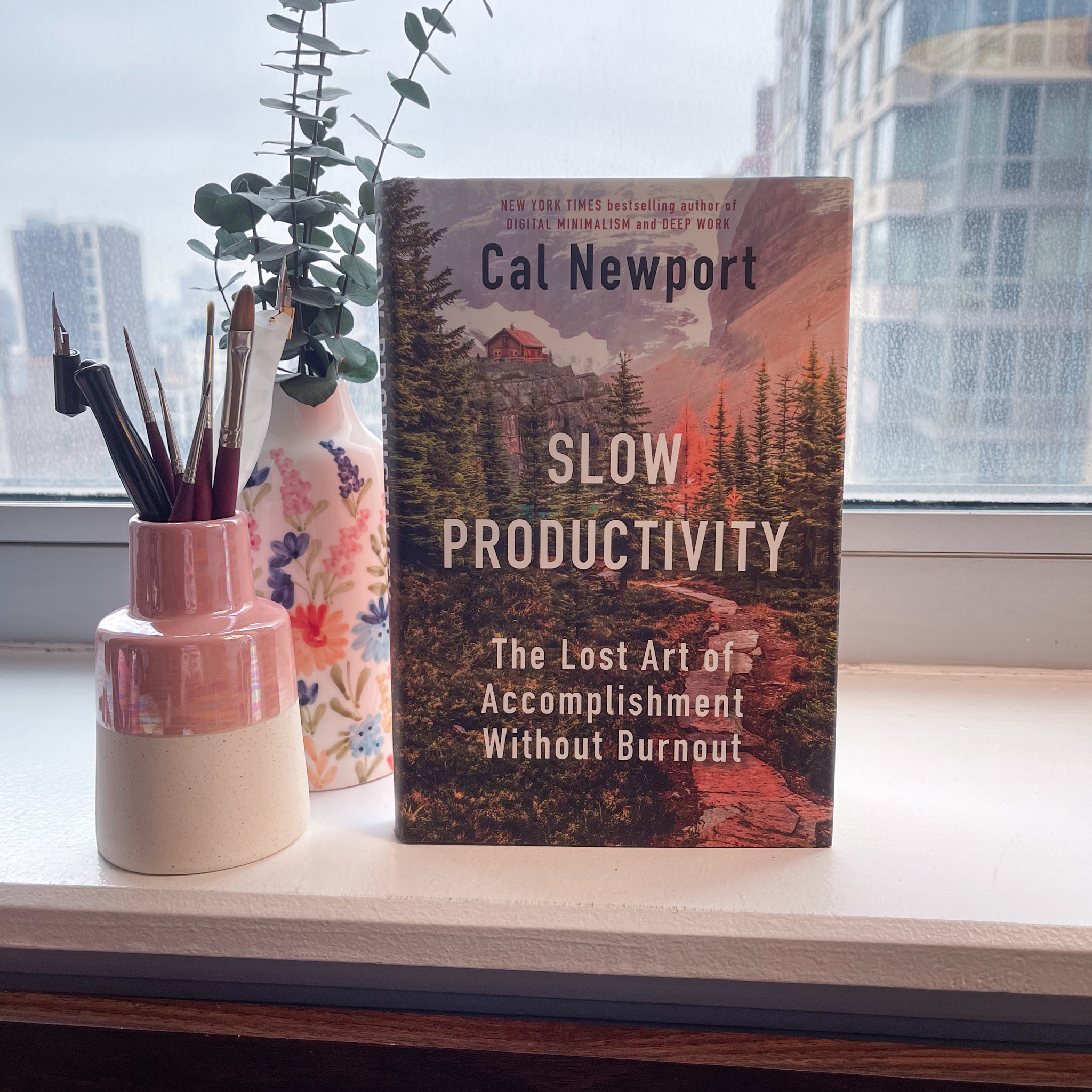 The book "Slow Productivity" standing upright on a desk